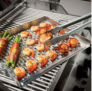 Broil King Flat Topper cooking food on BBQ