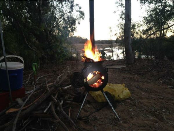 OzPig Portable Wood Stove installed in the bush